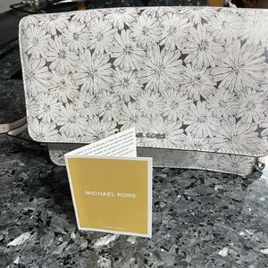 Micheal Kor gently used white handbag